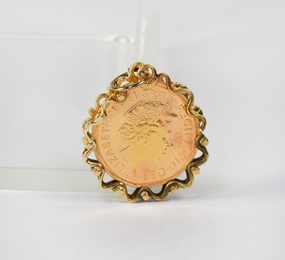 Lot 892 - An Elizabeth II sovereign, 2002, in a 14ct...