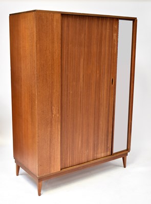 Lot 15 - AUSTIN SUITE; a mid-20th century teak wardrobe...