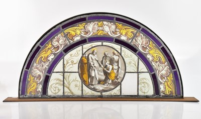 Lot 1293 - A Victorian stained glass fan shaped panel,...