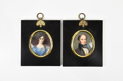 Lot 1190 - A pair of 19th century portrait miniatures,...