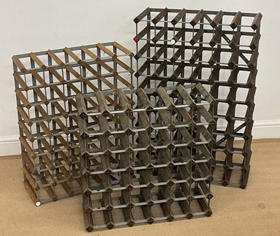 Lot 740 - Three graduated wine racks, largest 90 x 61 x...