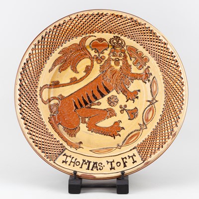 Lot 407 - JOHN HUDSON (born 1946); a slipware charger in...