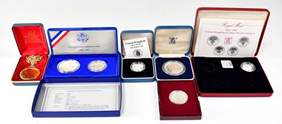 Lot 808 - A quantity of cased coinage, to include a...