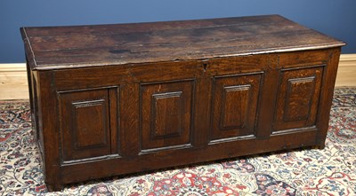 Lot 2740 - An 18th century oak coffer, with four panel...