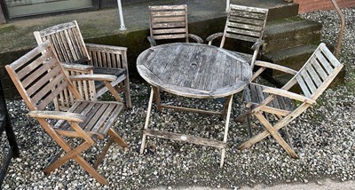 Lot 755 - A teak Royalcraft garden table and five chairs,...