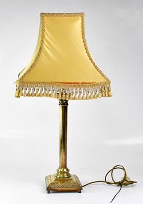 Lot 155 - A brass table lamp in the form of a Corinthian...