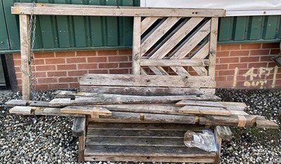 Lot 756 - A teak garden swing seat, height 200cm, depth...