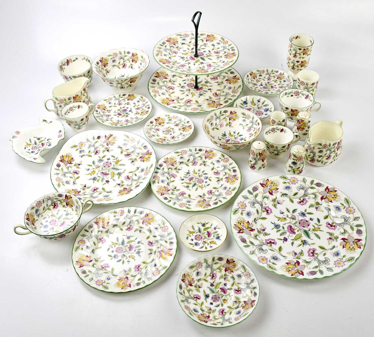 Lot 740 - MINTON; a 'Haddon Hall' pattern part dinner