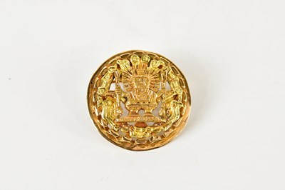 Lot 1245 - A pierced yellow metal combination...