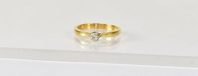 Lot 820 - An 18ct yellow gold diamond solitaire ring,...