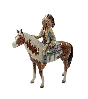 Lot 629 - BESWICK; a ceramic model of a Native American...