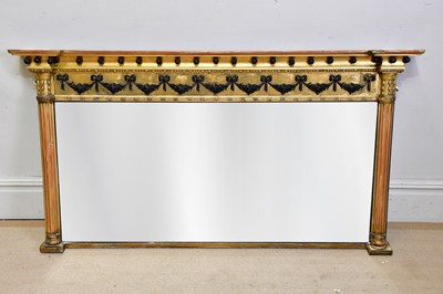 Lot 217 - A Regency gilt and ebonised overmantel mirror,...