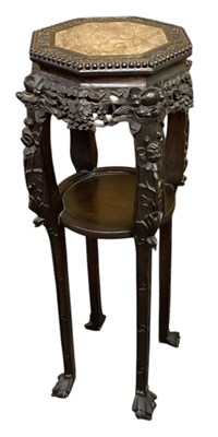 Lot 36 - A large Chinese hardwood jardinière stand,...