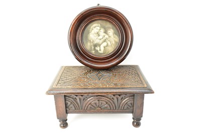 Lot 64 - A 19th century footstool with carved top and...