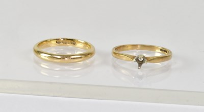 Lot 849 - A 9ct yellow gold wedding band, size O, and a...