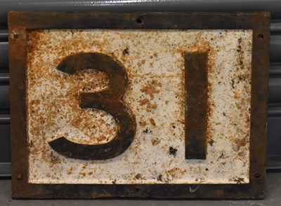 Lot 379 - RAILWAYANA; a cast iron rectangular plaque '31'...