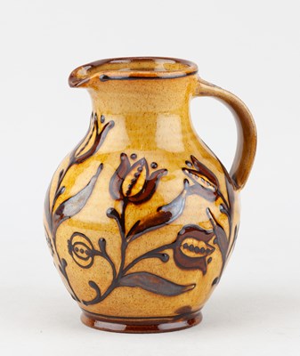 Lot 312 - HANNAH McANDREW (born 1977); a slipware jug,...