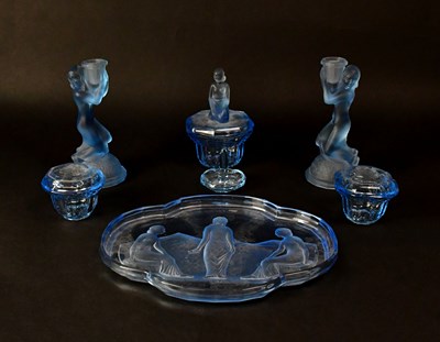 Lot 249 - A blue glass dressing table set comprising...