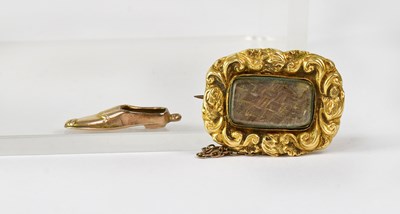 Lot 873 - A Georgian yellow metal mourning brooch set...