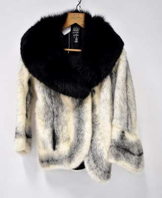 Lot 383 - A black and white fur jacket/coat with black...