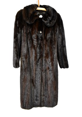 Lot 386 - A full-length mink coat, with brown satin...