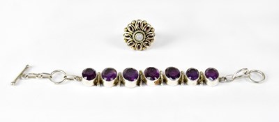 Lot 935 - A 925 silver bracelet set with oval amethyst...