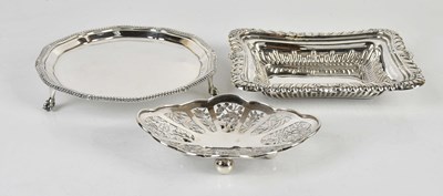 Lot 283 - WANG HING; a Chinese silver dish of shaped...