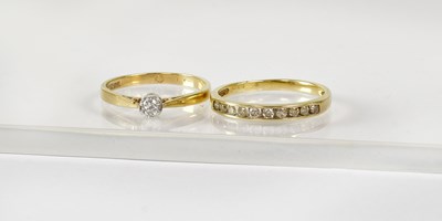 Lot 848 - A 9ct gold solitaire diamond ring, in white...