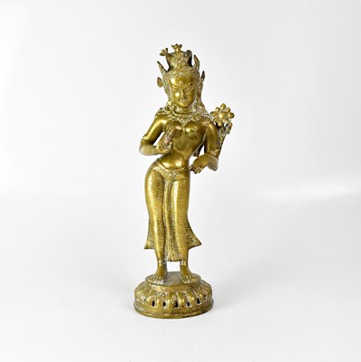 Lot 279 - An Indian brass figure of Tara Parvati on a...