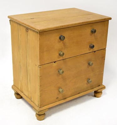 Lot 44 - A 19th century rustic small pine commode in...