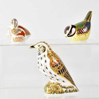 Lot 213 - ROYAL CROWN DERBY; three paperweights...