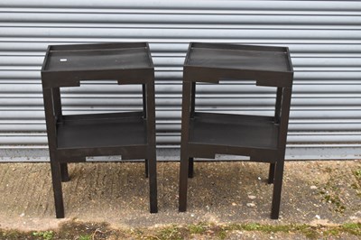 Lot 84 - A pair of modern ebonised rectangular two tier...