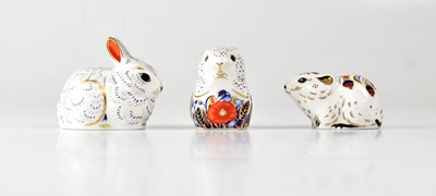 Lot 215 - ROYAL CROWN DERBY; three paperweights...