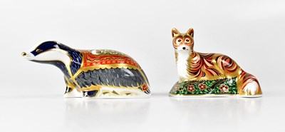 Lot 212 - ROYAL CROWN DERBY; two paperweights comprising...