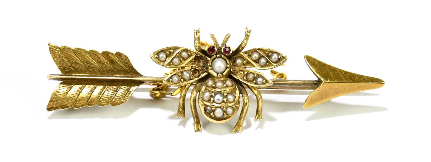 Lot 1418 - An Edwardian yellow metal insect set arrow