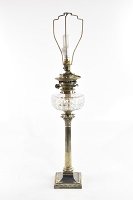 Lot 4 - A Victorian silver plated oil lamp, with cut...