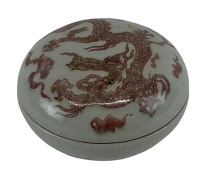 Lot 1021 - A Chinese underglazed red circular lidded pot,...