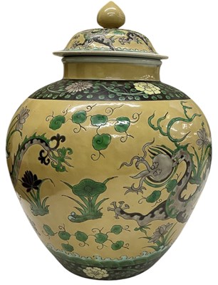 Lot 723 - A Chinese beige ground porcelain lidded urn,...