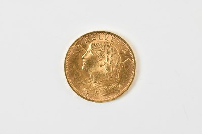 Lot 666 - A Swiss twenty franc 1927 gold coin, approx 6.5g.