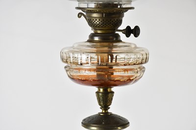 Lot 2645 - A 19th century bronze oil lamp with cut glass...
