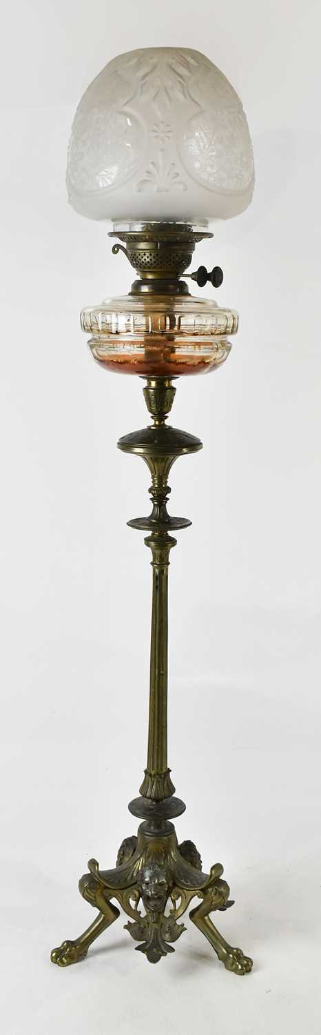 Lot 2645 - A 19th century bronze oil lamp with cut glass...