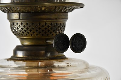 Lot 2645 - A 19th century bronze oil lamp with cut glass...