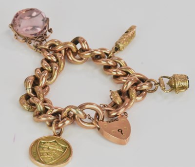 Lot 525 - A Victorian rose gold curb link bracelet set...