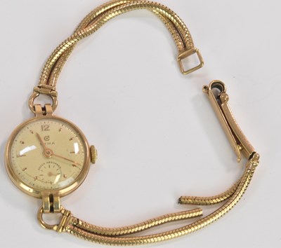 Lot 658 - CYMA; a lady's vintage 9ct gold wristwatch,...