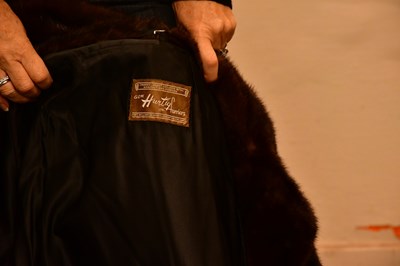 Lot 1959 - HURTIG FURRIERS, CALGARY; a full length dark...