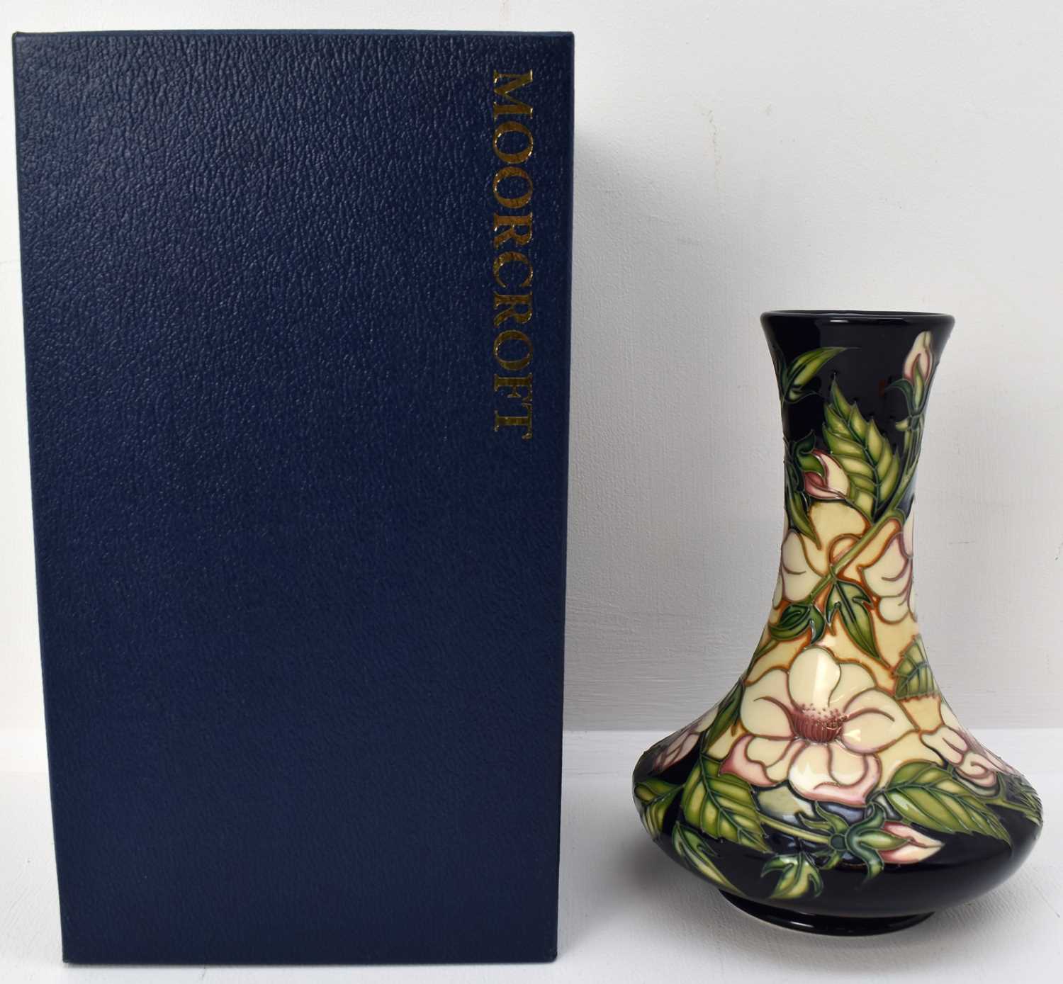 Lot 535 - MOORCROFT; a modern 'Tea Rose' pattern vase by...