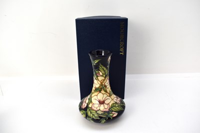 Lot 535 - MOORCROFT; a modern 'Tea Rose' pattern vase by...
