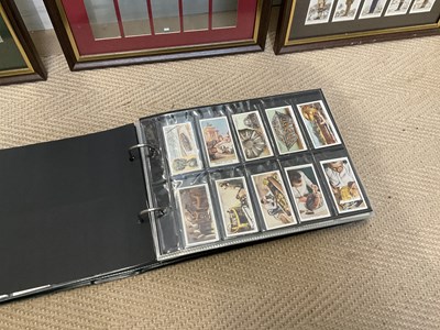 Lot 1092 - A collection of framed cigarette cards, mainly...