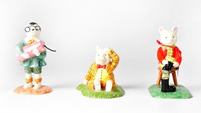 Lot 147 - ROYAL DOULTON; three Rupert the Bear figures,...