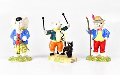 Lot 149 - ROYAL DOULTON; three Rupert the Bear figures,...